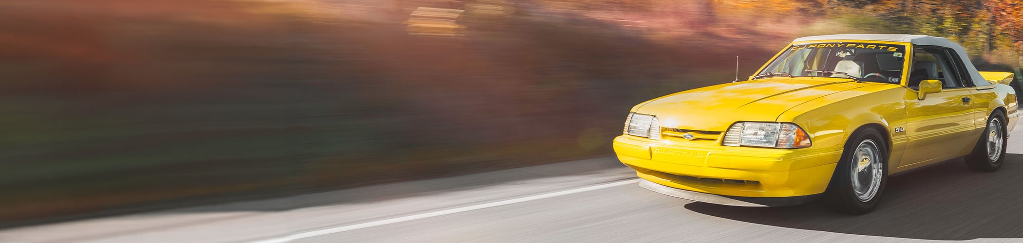 Image of yellow Mustang
