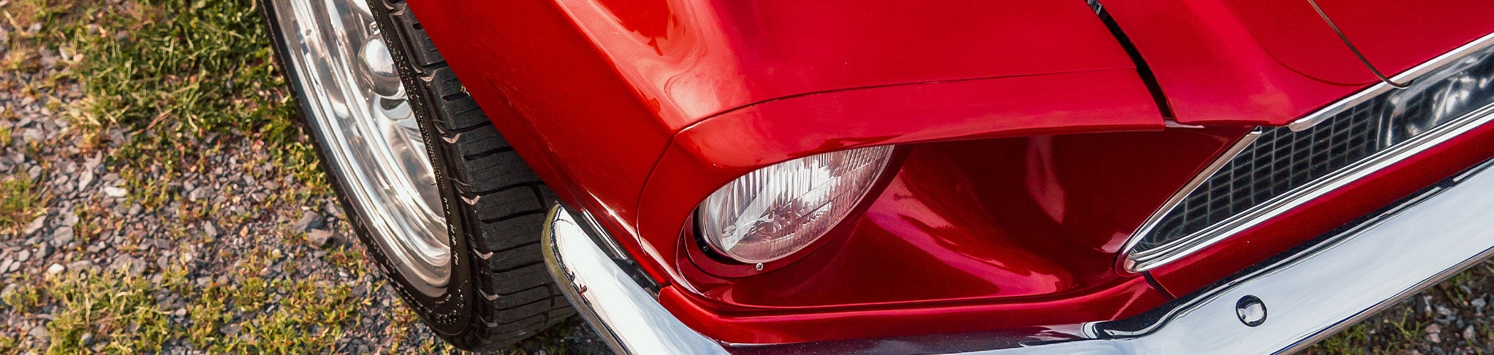 Close up of a red Mustang
