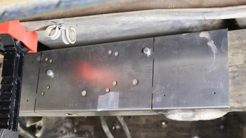 A properly-aligned frame template bolted to the frame of the truck