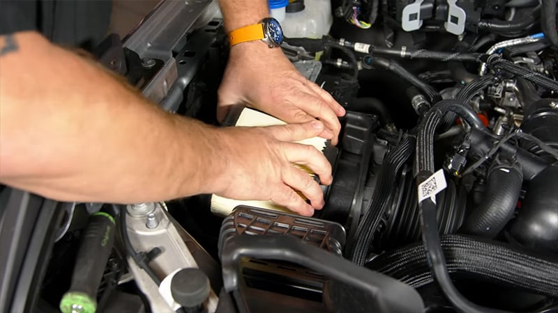 Pulling 6th gen Bronco's factory air filter out of intake