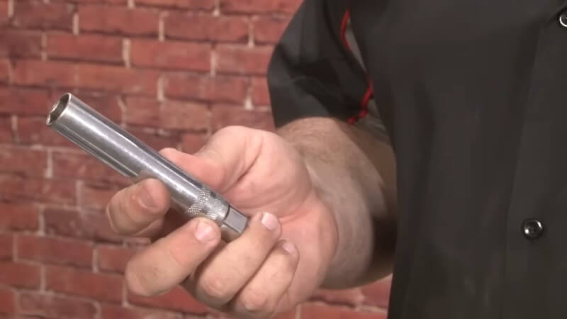 Mechanic holding a 5/8 inch socket
