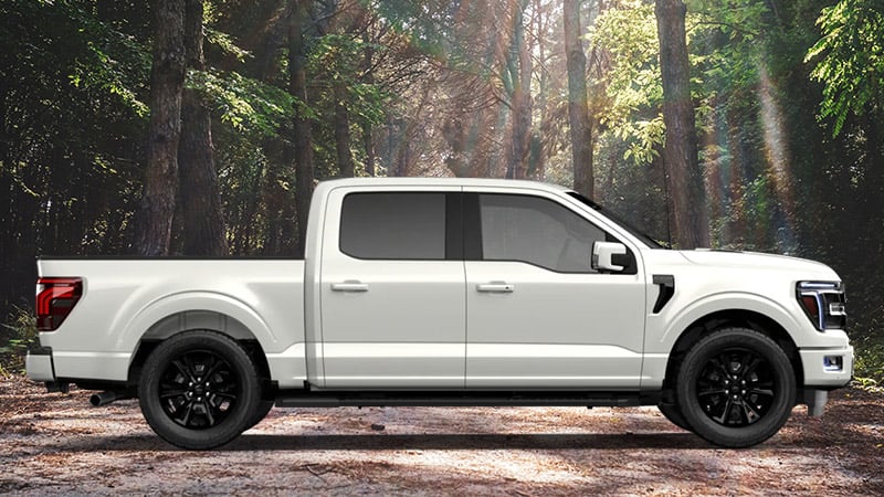 A bright white metallic Ford F150 truck