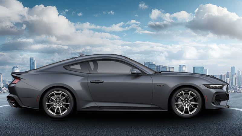 A side-angle render of a 2027 Mustang GT in Carbonized Gray Metallic