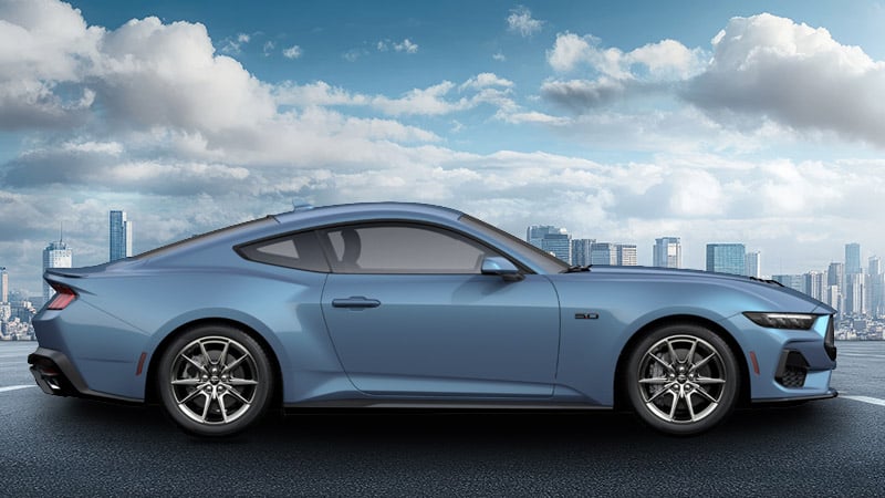 A side-angle render of a 2027 Mustang GT in Vapor Blue Metallic