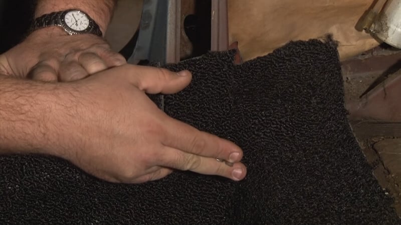 Cutting the carpet flap so it lays flat against the trim panel
