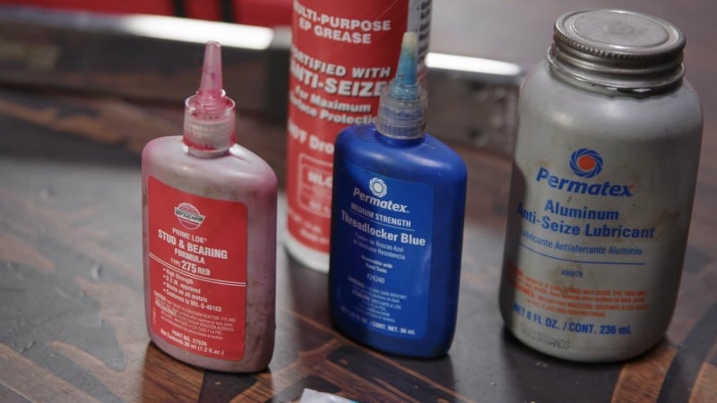Various mechanical car fluids on a table