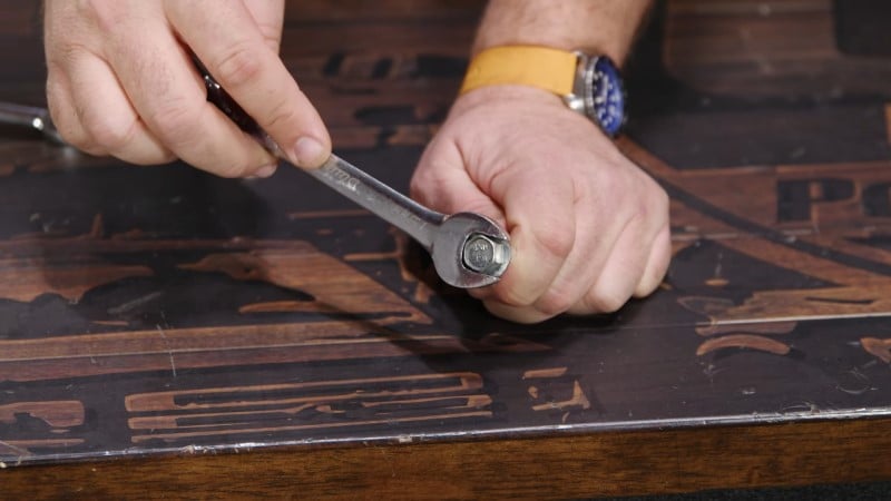 Wrench tightening a bolt