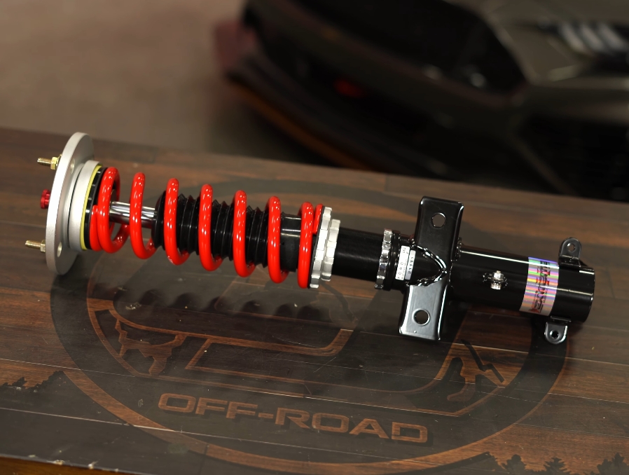 Set Of Mustang Coilovers On a Table