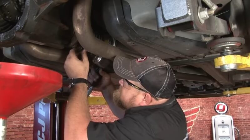Unscrewing a Ford Mustang Driveshaft Bolt