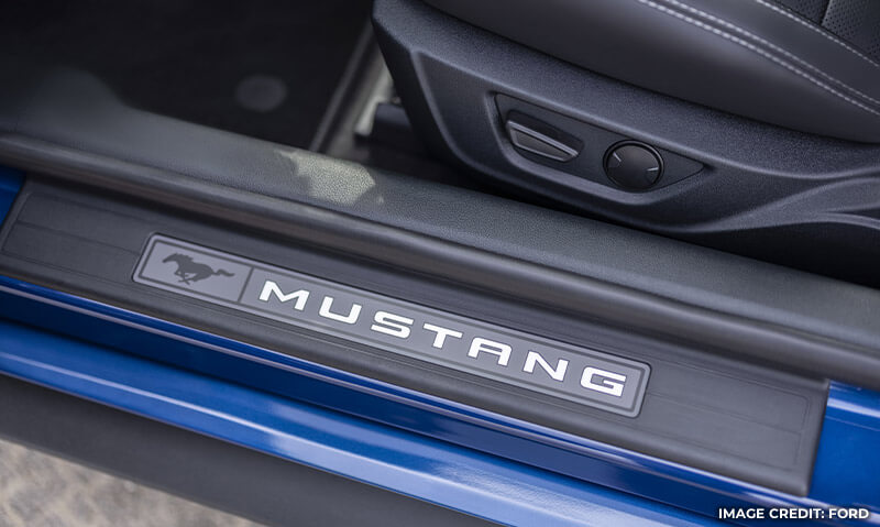 Light up door sill that says “Mustang”