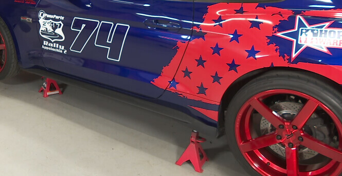 Mustang resting on jack stands