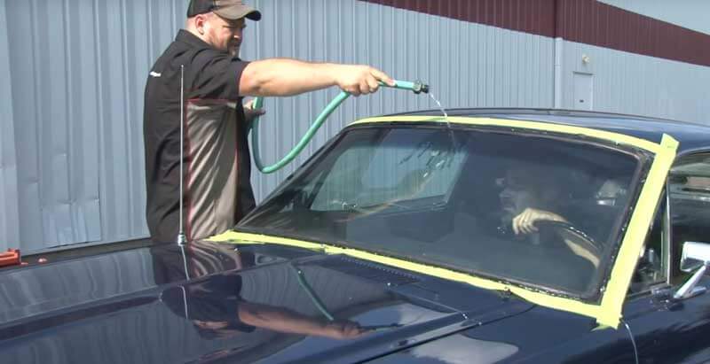 Holding hose over seal to test it