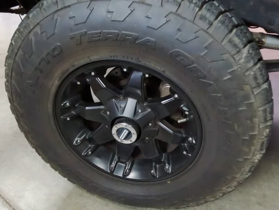A close up of aftermarket wheels on a Ford Bronco