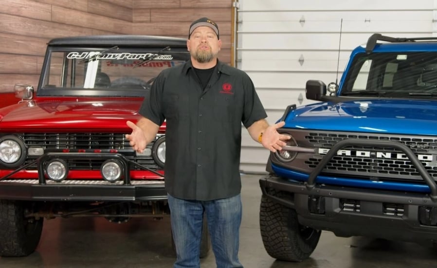 A side-by-side comparison of a classic Bronco and a modern Bronco