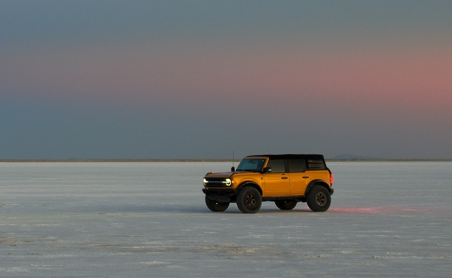 Ford Bronco driving across salt flats